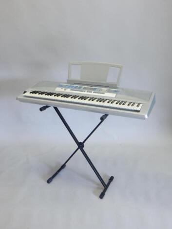 A Yamaha portable grand piano DGX-200