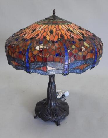 A bronzed Tiffany style lamp