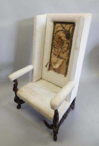 An oak wingback armchair in late 17thC style