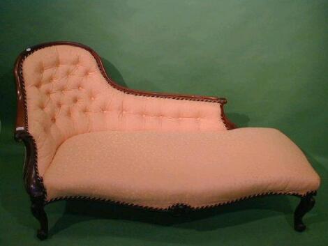 A Victorian mahogany chaise longue