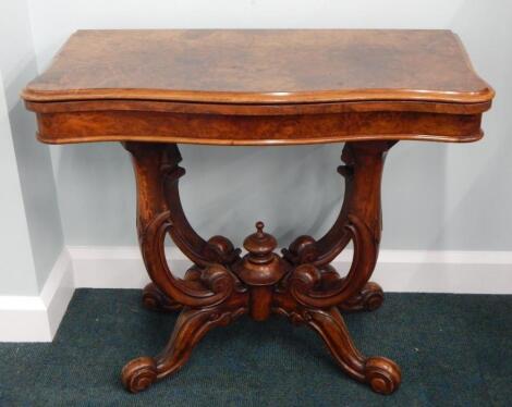 A Victorian burr walnut card table