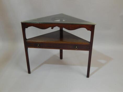 An unusual mahogany corner wash stand