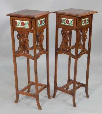 A pair of 20thC Art Nouveau style plant stands