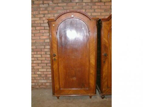 A Victorian flamed mahogany single wardrobe