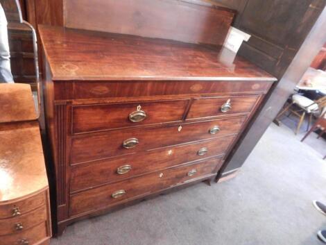 An early 19thC mahogany and inlaid chest of drawers