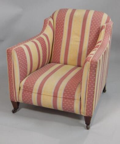 An Edwardian mahogany and boxwood strung tub shaped chair