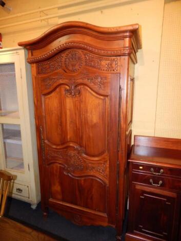 A Continental walnut wardrobe in 18thC style