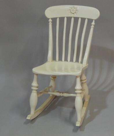 A Victorian painted rocking chair