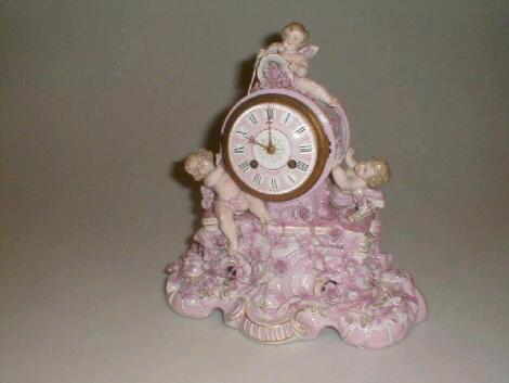 A Sitzendorf porcelain figural mantel clock