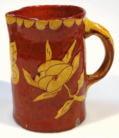 An early 20thC slipware jug
