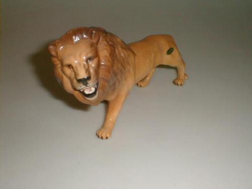 A Beswick Lion, model no 2089, designed by Graham Tongue, golden