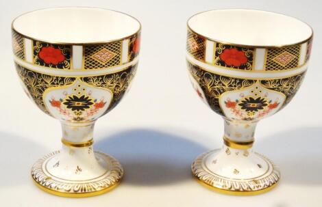 A pair of Royal Crown Derby bone china Imari pattern goblets