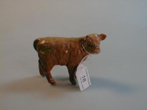 A Beswick figure No. 1872D a Highland calf