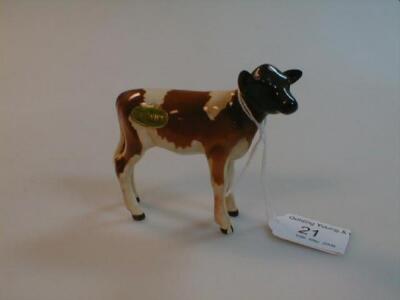 A Beswick figure No. 1249B Ayrshire calf