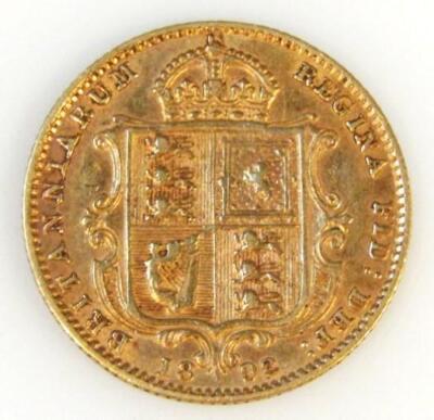 A Victorian shield back gold half sovereign