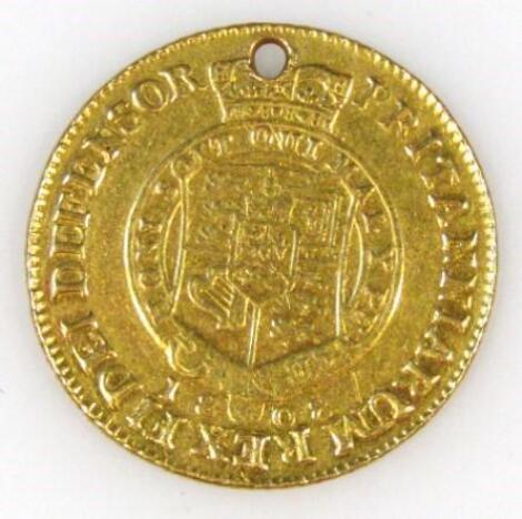 A George III gold half guinea