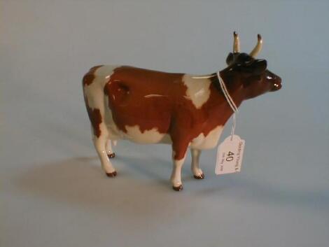 A Beswick figure, No. 1350 Ayrshire Cow, ch. "Ickham Bessie".