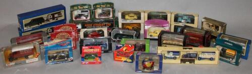 Various boxed die-cast vehicles