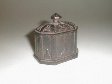 A Victorian cast iron tobacco box