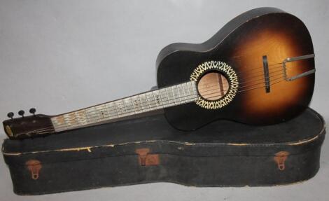 A 20thC Harmony acoustic guitar