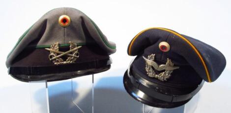 Two German officer's hats