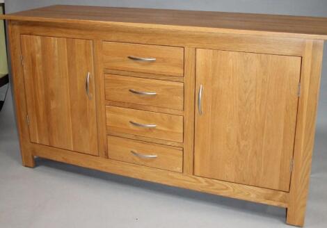 A modern light wood sideboard