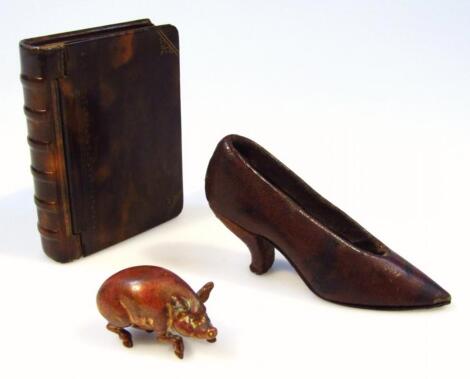 A metal cased and horn miniature book casket