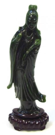 An early 20thC jadeite figure of a standing geisha