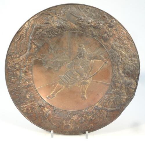 An oriental design copper dish