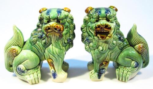 A pair of Chinese pottery Dogs of Fo