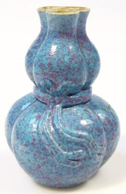 A Chinese enamel finish porcelain triple gourd vase