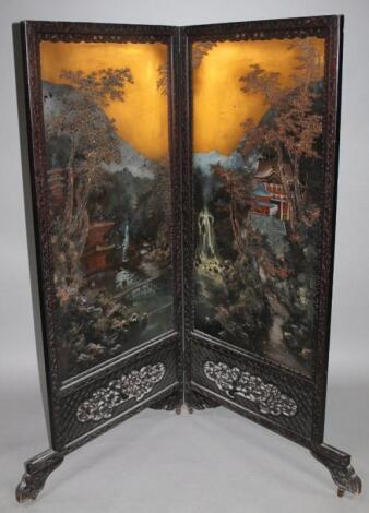 A Chinese hardwood two fold dividing screen