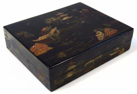 An oriental black lacquer travel box