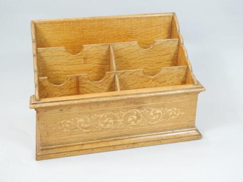 A late 19th/early 20thC oak and marquetry letter rack