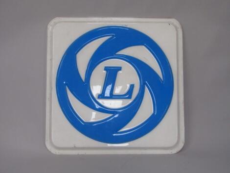 A Leyland L Logo single sided opal plastic dished sign
