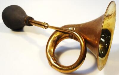 A 1920's style brass car horn