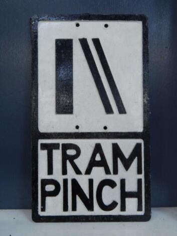 A cast aluminium Tram Pinch road sign