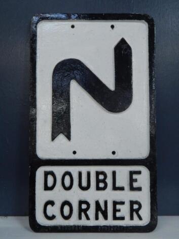 A cast aluminium Double Corner sign