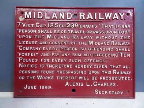 A Midland Railway cast iron sign