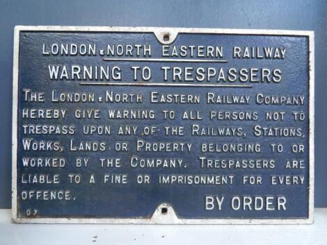 A cast iron London and North Eastern Railway Trespassing Notice