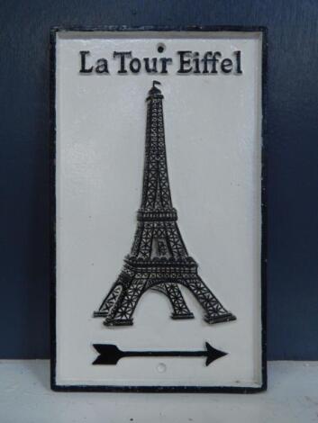 A cast iron La Tour Eiffel reproduction sign