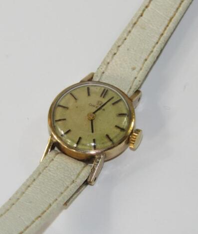 An Omega 9ct gold lady's wristwatch