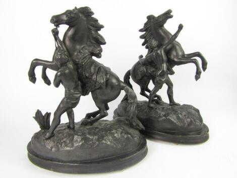 A pair of late 19thC spelter figures of Marley horses