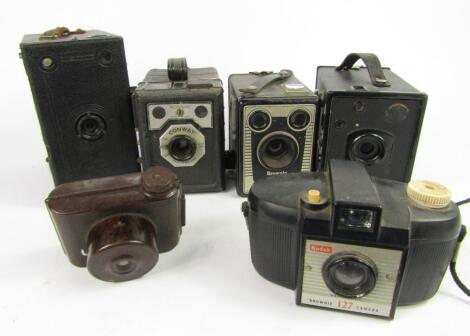 Cameras including a J B Ensign