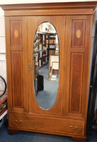 An Edwardian mahogany wardrobe