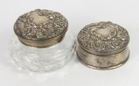 A matched Elizabeth II silver part dressing table set