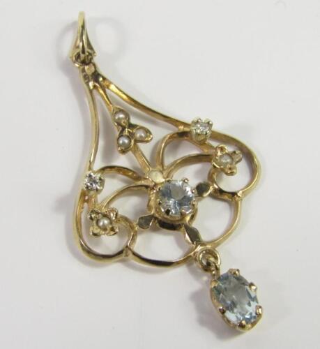 An Art Nouveau style 9ct gold aquamarine diamond and sead pearl pendant