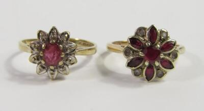 A ruby and diamond flower head ring