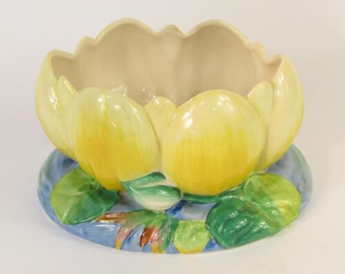 A Clarice Cliff pottery water lily vase