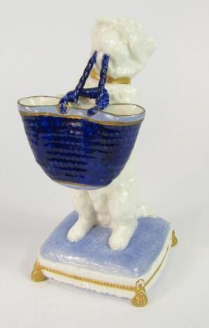 A late 19thC Brownfield porcelain figure of a dog